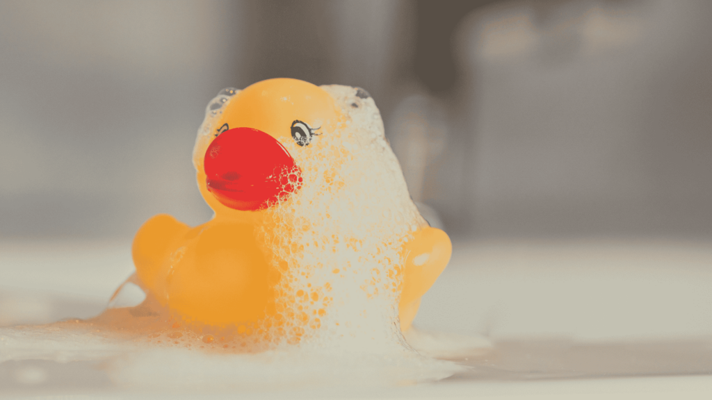 rubber duck with bubbles on head
